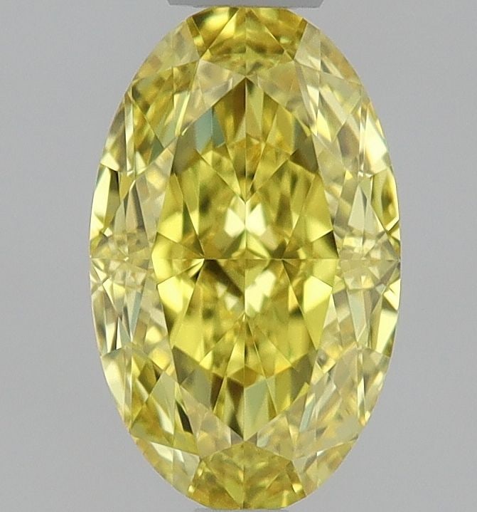 Loose Diamond - OVAL 0.53ct Fancy Vivid Yellow VVS1: Loose Diamond - OVAL 0.53ct Fancy Vivid Yellow VVS1 Source: Natural Shape: OVAL Carats: 0.53 Color: Fancy Vivid Yellow Certification: GIA The Diamond Depot Guarantee: All items in this auction are gua