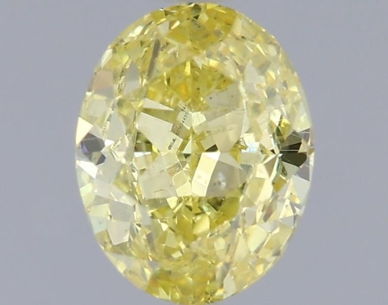 Loose Diamond - OVAL 0.72ct Fancy Intense Yellow SI2: Loose Diamond - OVAL 0.72ct Fancy Intense Yellow SI2 Source: Natural Shape: OVAL Carats: 0.72 Color: Fancy Intense Yellow Certification: GIA Video: