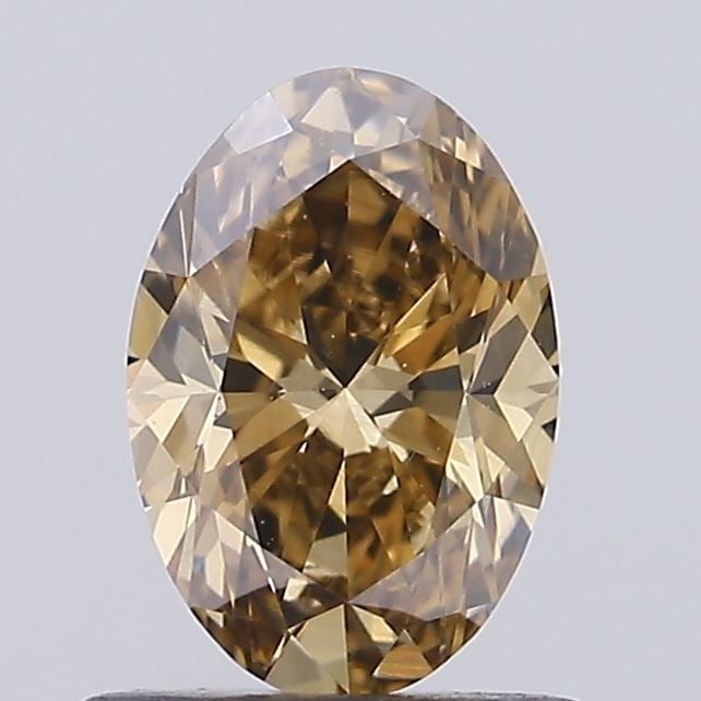 Loose Diamond - OVAL 0.8ct Fancy Brown VS2: Loose Diamond - OVAL 0.8ct Fancy Brown VS2 Source: Natural Shape: OVAL Carats: 0.8 Color: Fancy Brown Certification: NONE Video: