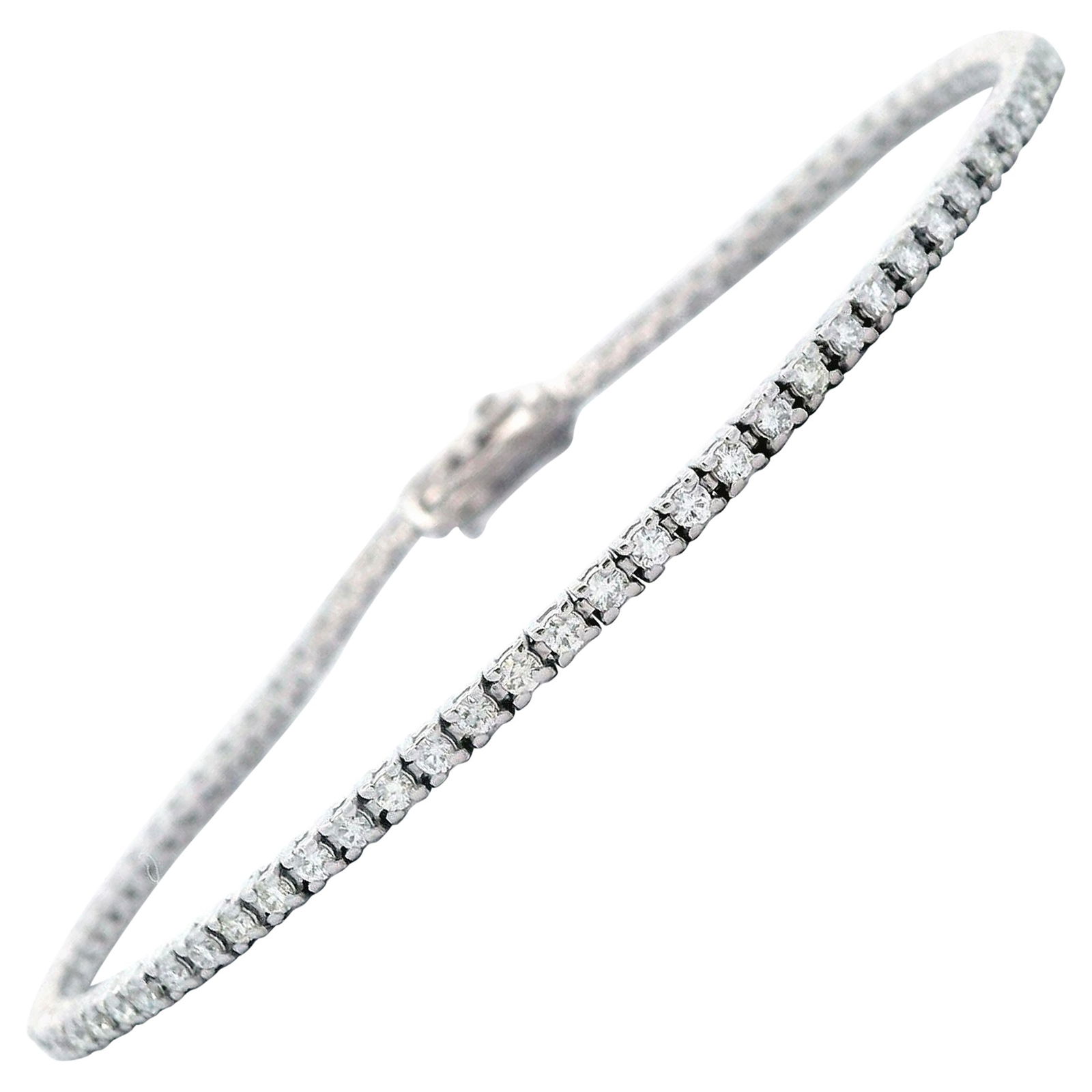 1.26ct F VS1 Diamond Tennis Bracelet 18k White Gold: 1.26ct F VS1 Diamond Tennis Bracelet 18k White Gold This exquisite tennis bracelet features 80 round brilliant diamonds with a total weight of 1.26 carats, showcasing F/G color and VS clarity. Set in