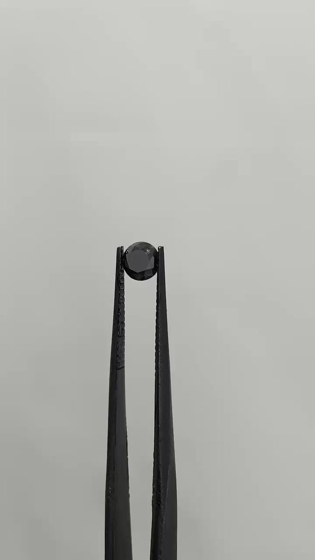 Loose Diamond - ROUND 0.42ct Fancy Black VVS2: Loose Diamond - ROUND 0.42ct Fancy Black VVS2 Source: Natural Shape: ROUND Carats: 0.42 Color: Fancy Black Certification: GIA Video: