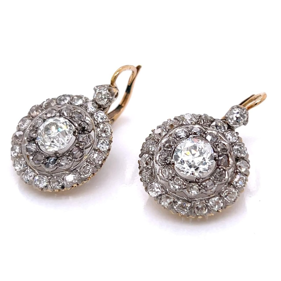 Victorian 18K Gold Platinum Diamond Earrings 1.54 Ct 1.43 Ct: Victorian 18K Gold Platinum Diamond Earrings 1.54 Ct 1.43 Ct Discover the exquisite craftsmanship of these Victorian earrings, crafted from 18K gold and platinum. These stunning earrings feature two p