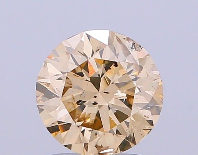 Loose Diamond - ROUND 1.29ct Light Brown SI2: Loose Diamond - ROUND 1.29ct Light Brown SI2 Source: Natural Shape: ROUND Carats: 1.29 Color: Light Brown Certification: NONE Video: