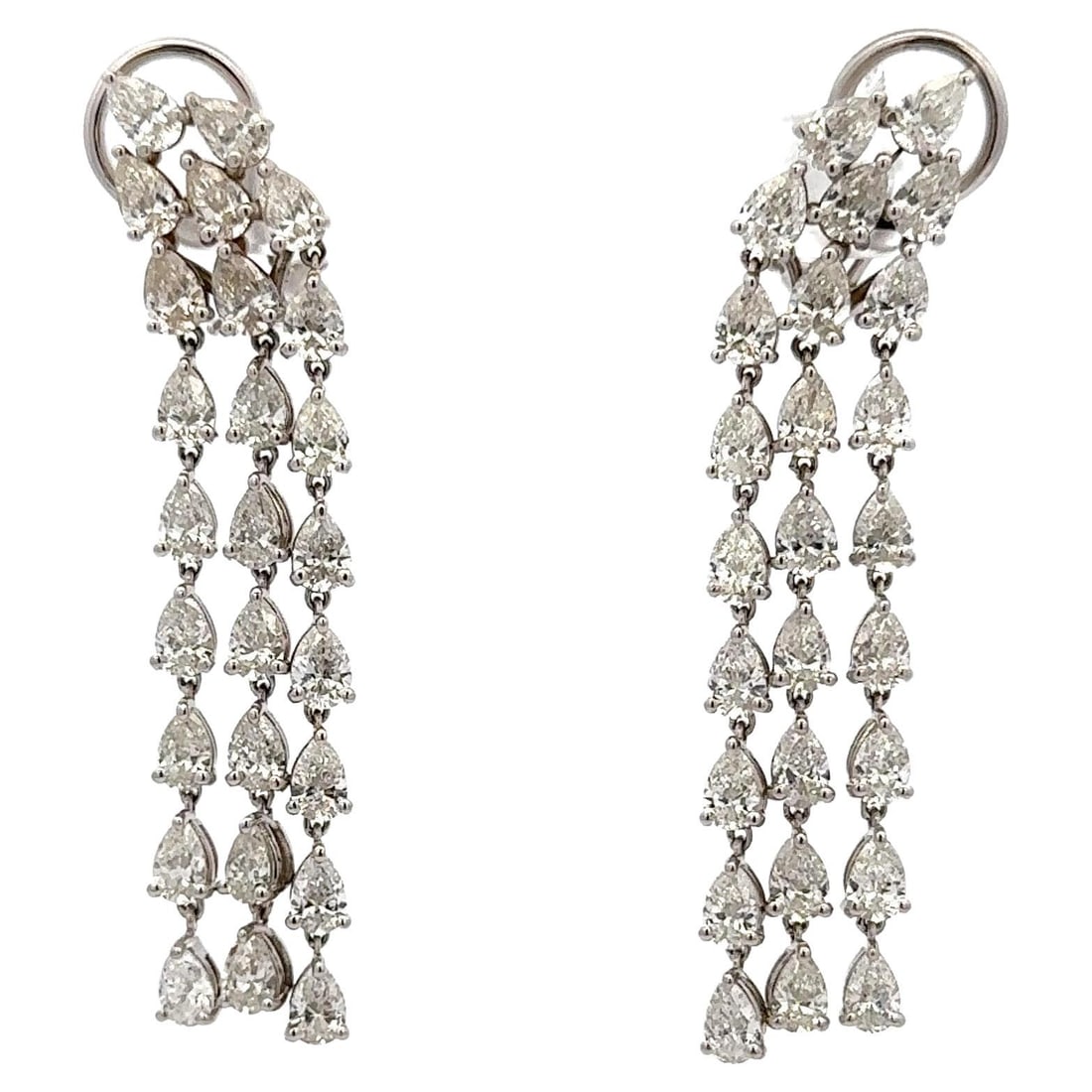 Harbor Diamonds 18K White Gold 3 Row Pear Shape Diamond Earrings 9.96ct: Harbor Diamonds 18K White Gold 3 Row Pear Shape Diamond Earrings 9.96ct Discover the elegance of these contemporary three-row drop earrings, showcasing a stunning collection of 52 pear-shaped diamonds