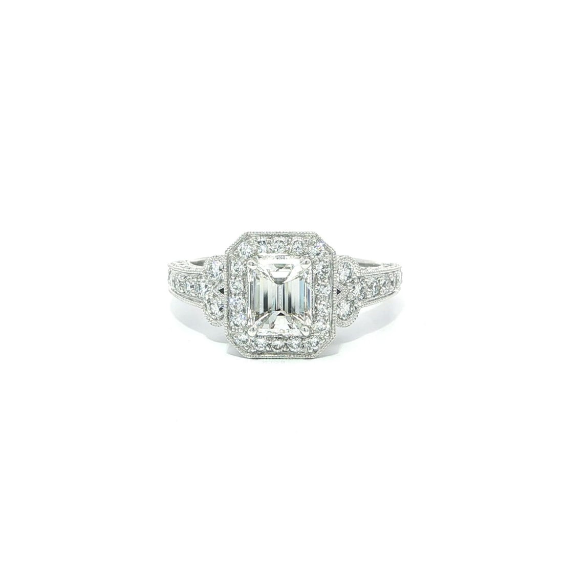Stunning 18k White Gold 2.04ct Emerald Diamond Engagement Ring: Stunning 18k White Gold 2.04ct Emerald Diamond Engagement Ring This stunning engagement ring features a unique design crafted from solid 18k white gold. The centerpiece is a natural emerald-cut diamon