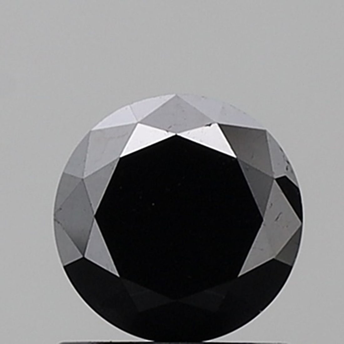 Loose Diamond - ROUND 1.18ct Fancy Black VVS2: Loose Diamond - ROUND 1.18ct Fancy Black VVS2 Source: Natural Shape: ROUND Carats: 1.18 Color: Fancy Black Certification: NONE Video: