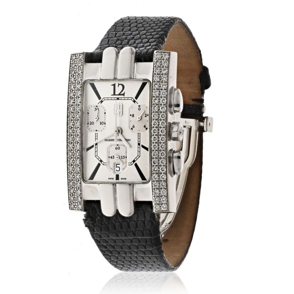 Harry Winston 18K White Gold Automatic Ladies Watch Model 310UCQWG: Harry Winston 18K White Gold Automatic Ladies Watch Model 310UCQWG Discover the elegance of this vintage Harry Winston ladies watch, crafted from luxurious 18K white gold. This exquisite timepiece fea