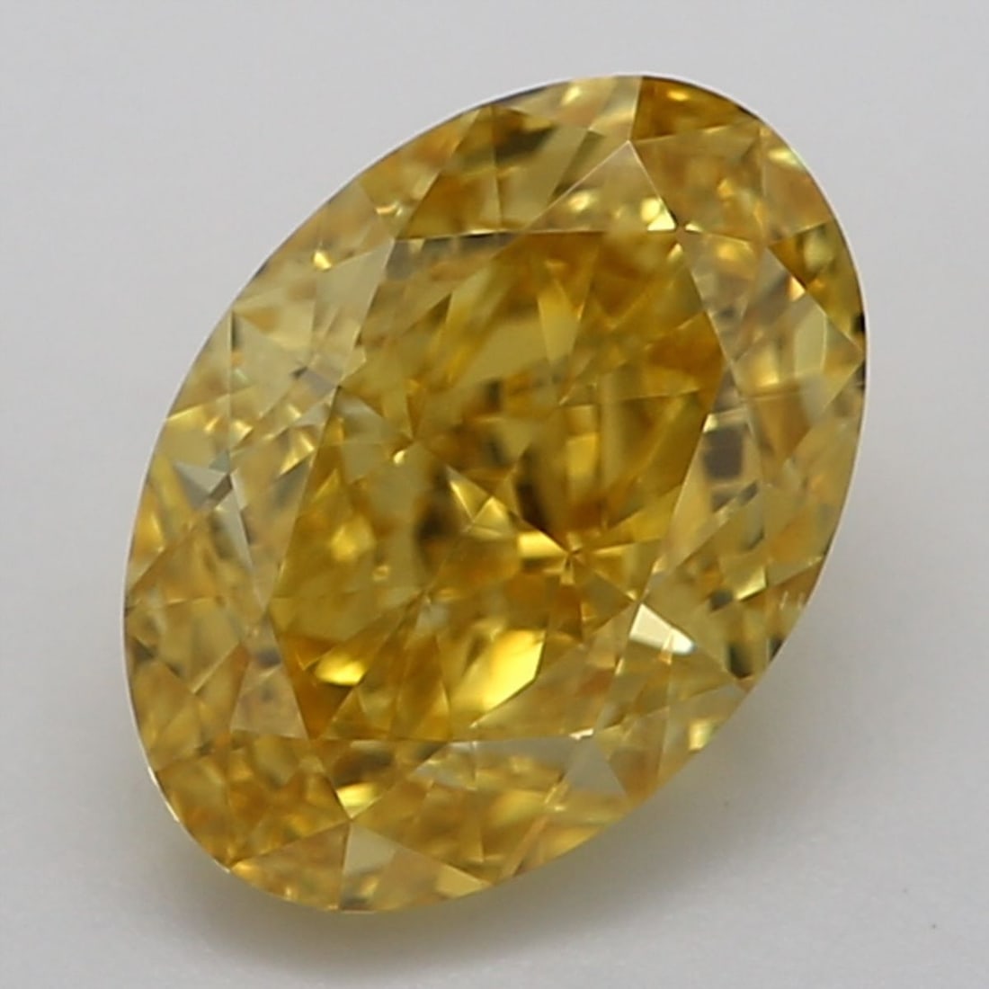 Loose Diamond - OVAL 0.84ct Fancy Vivid Orangey Yellow VS2: Loose Diamond - OVAL 0.84ct Fancy Vivid Orangey Yellow VS2 Source: Natural Shape: OVAL Carats: 0.84 Color: Fancy Vivid Orangey Yellow Certification: GIA Video: