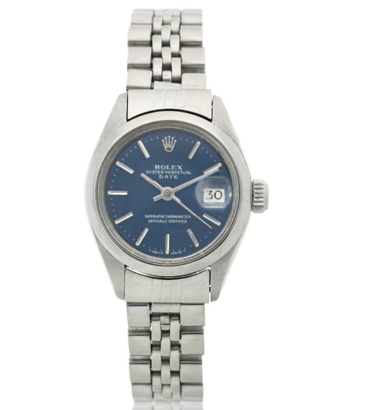Ladies Rolex 6916 Blue Dial Date Watch with Jubilee Bracelet: Ladies Rolex 6916 Blue Dial Date Watch with Jubilee Bracelet This Rolex Oyster Perpetual Date features a blue dial and is designed for ladies. The watch includes a smooth bezel and is paired with a Ju
