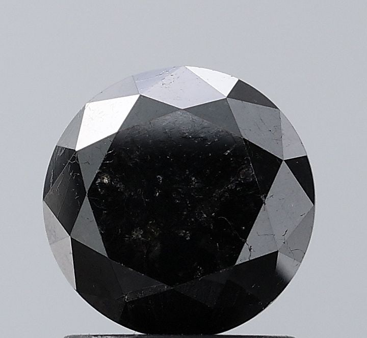 Loose Diamond - ROUND 1.85ct Fancy Black VS1: Loose Diamond - ROUND 1.85ct Fancy Black VS1 Source: Natural Shape: ROUND Carats: 1.85 Color: Fancy Black Certification: NONE Video: