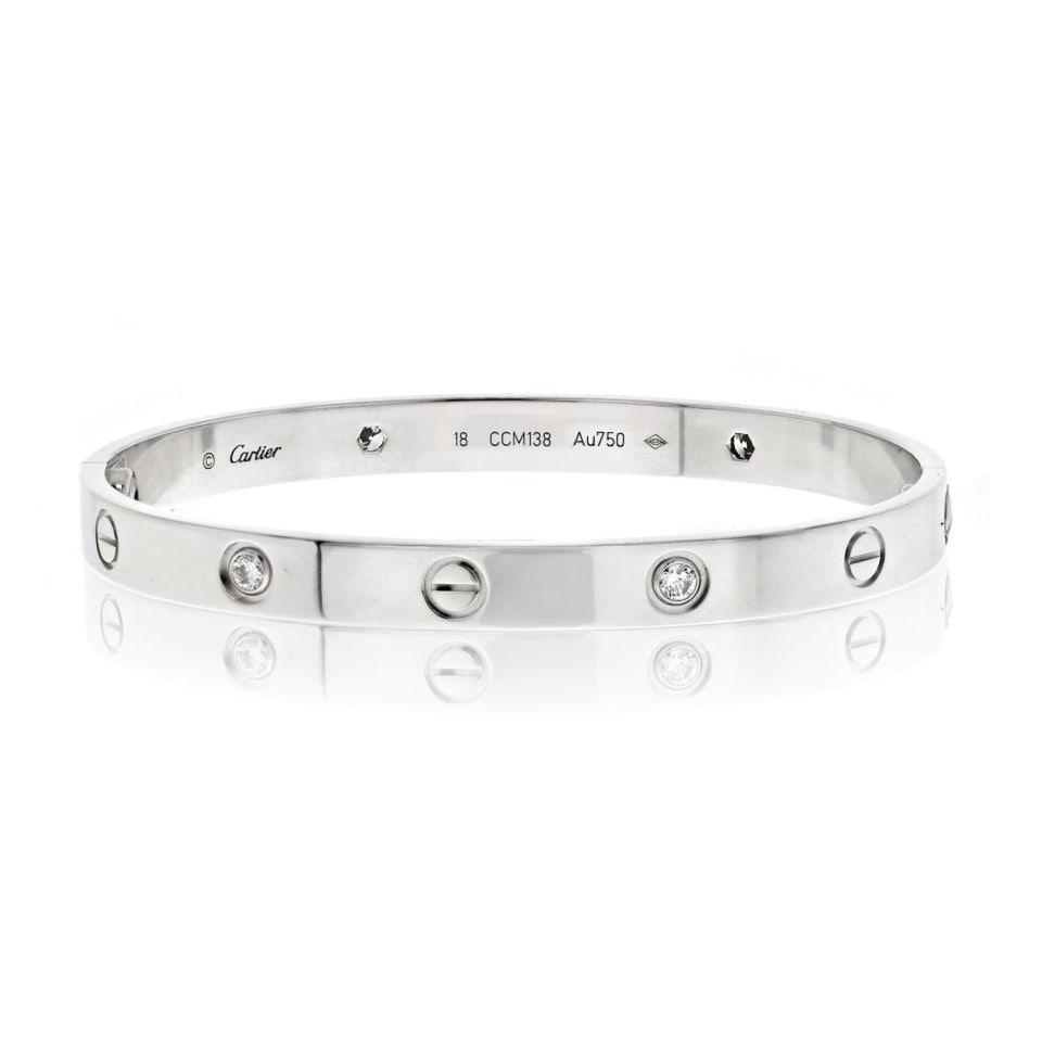Cartier Love Bracelet 18K White Gold 4 Diamonds Authentic Size 18: Cartier Love Bracelet 18K White Gold 4 Diamonds Authentic Size 18 Elevate your accessory collection with the Cartier Love 18K White Gold Love 4 Diamond Bracelet. This exquisite piece is crafted from 1