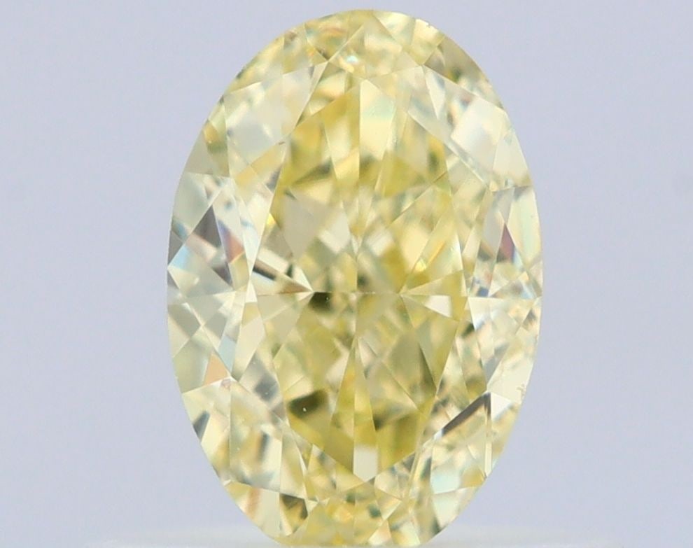 Loose Diamond - OVAL 0.56ct Fancy Yellow VS1: Loose Diamond - OVAL 0.56ct Fancy Yellow VS1 Source: Natural Shape: OVAL Carats: 0.56 Color: Fancy Yellow Certification: GIA Video: