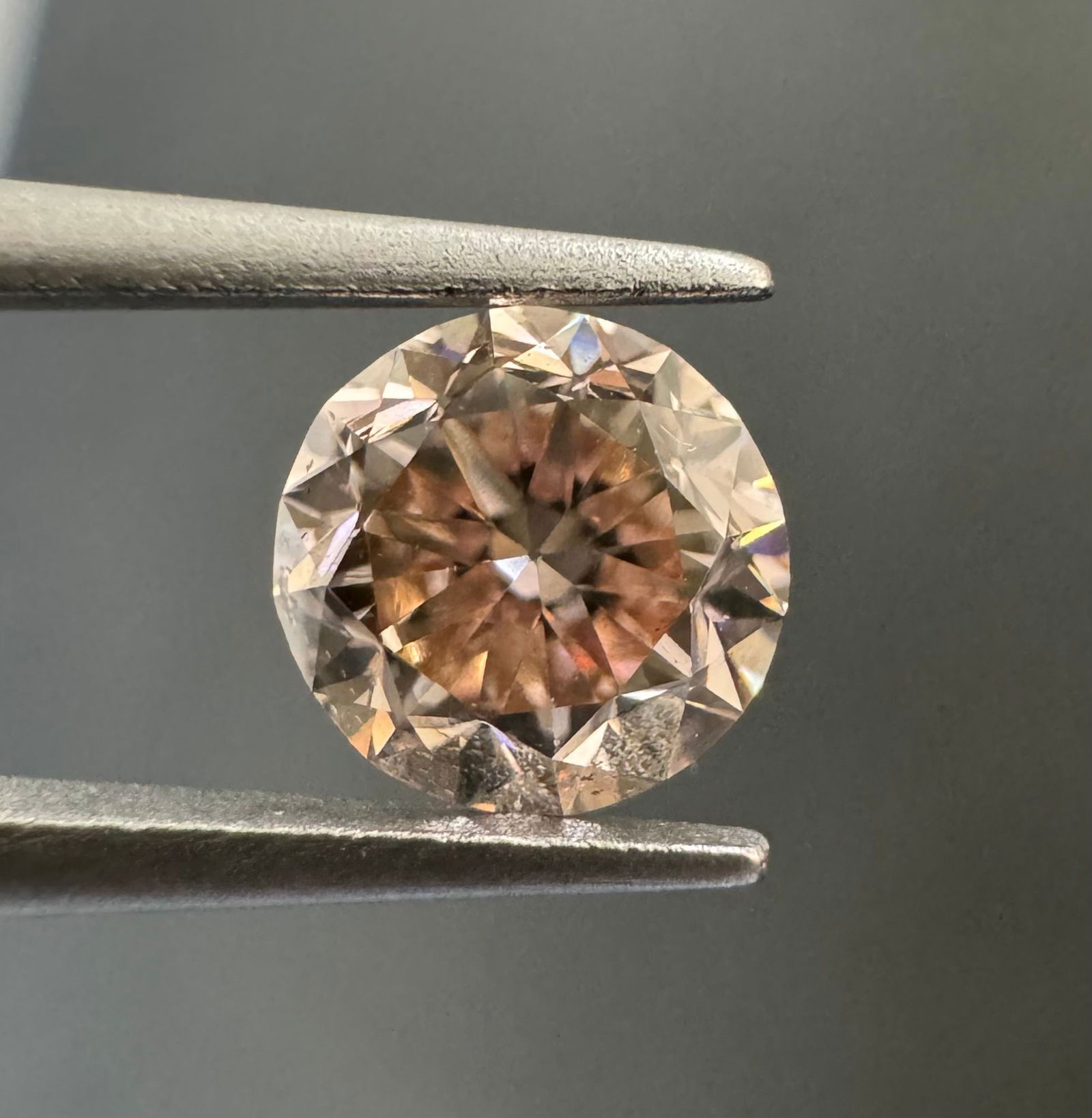 Loose Diamond - ROUND 0.51ct Fancy Pink Brown SI1: Loose Diamond - ROUND 0.51ct Fancy Pink Brown SI1 Source: Natural Shape: ROUND Carats: 0.51 Color: Fancy Pink Brown Certification: GIA Video: