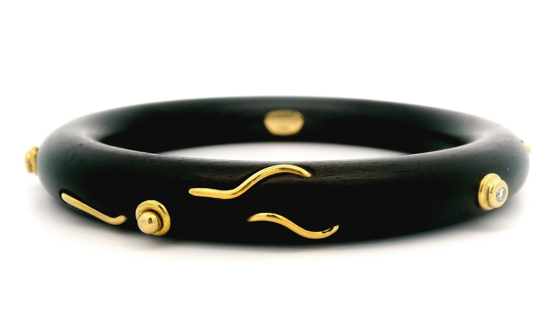 Denise Roberge 18k Yellow Gold Bangle Bracelet with Diamonds and Wood: Denise Roberge 18k Yellow Gold Bangle Bracelet with Diamonds and Wood This exquisite slip-on bangle bracelet by Denise Roberge combines the warmth of black wood with the luxury of solid 18k yellow gol