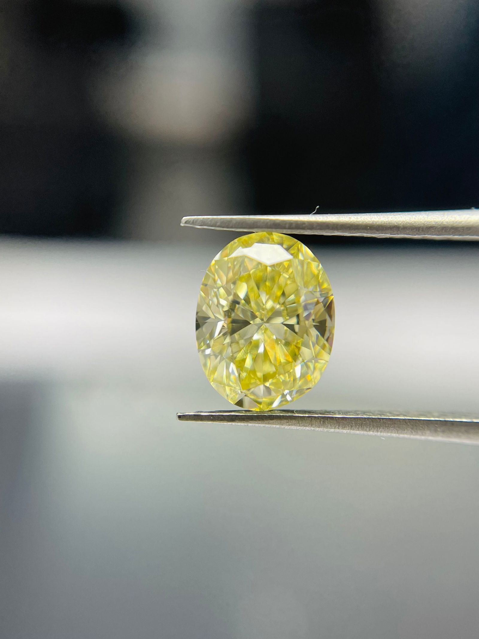 Loose Diamond - OVAL 1.02ct Fancy Yellow VS2: Loose Diamond - OVAL 1.02ct Fancy Yellow VS2 Source: Natural Shape: OVAL Carats: 1.02 Color: Fancy Yellow Certification: GIA The Diamond Depot Guarantee: All items in this auction are guaranteed to be