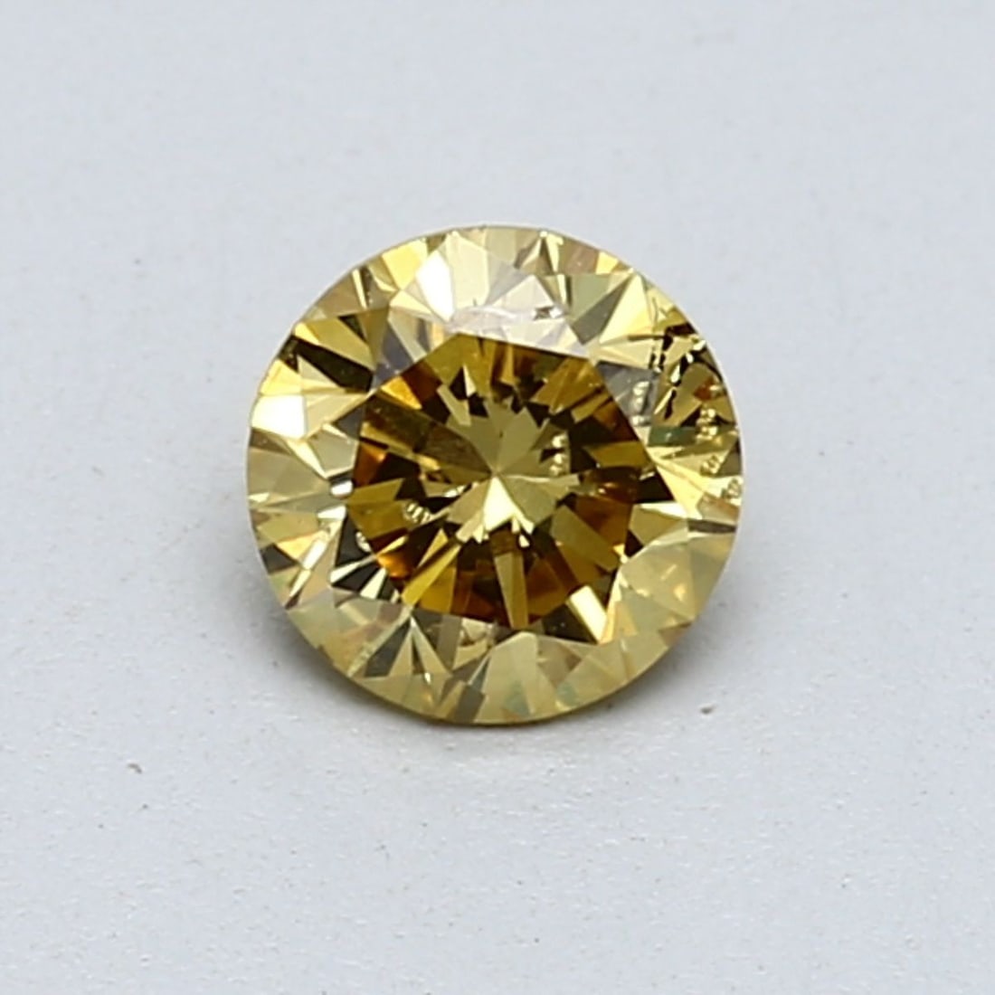 Loose Diamond - ROUND 0.61ct Fancy Vivid Yellow: Loose Diamond - ROUND 0.61ct Fancy Vivid Yellow Source: Natural Shape: ROUND Carats: 0.61 Color: Fancy Vivid Yellow Certification: GIA Video: