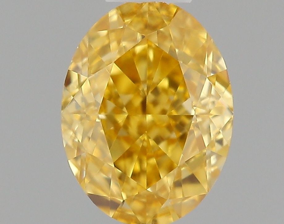 Loose Diamond - OVAL 0.3ct Fancy Vivid Orangey Yellow VVS2: Loose Diamond - OVAL 0.3ct Fancy Vivid Orangey Yellow VVS2 Source: Natural Shape: OVAL Carats: 0.3 Color: Fancy Vivid Orangey Yellow Certification: GIA Video: