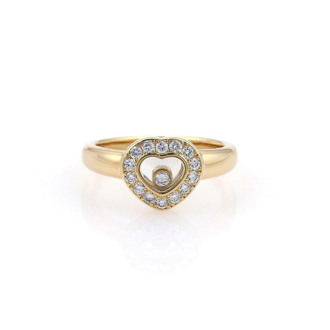 Chopard Happy Diamond Heart Ring 18k Yellow Gold with Floating Diamond: Chopard Happy Diamond Heart Ring 18k Yellow Gold with Floating Diamond This exquisite Chopard Happy Diamond ring is a stunning piece of jewelry crafted from luxurious 18k yellow gold. The ring feature