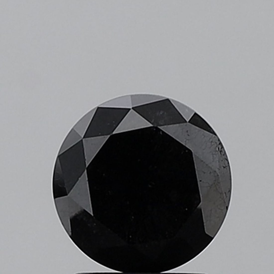 Loose Diamond - ROUND 2.18ct Fancy Black VVS2: Loose Diamond - ROUND 2.18ct Fancy Black VVS2 Source: Natural Shape: ROUND Carats: 2.18 Color: Fancy Black Certification: NONE Video: