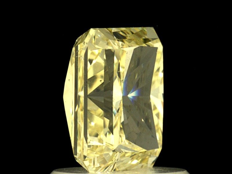 Loose Diamond - ROUND 1.46ct Fancy Yellow SI1: Loose Diamond - ROUND 1.46ct Fancy Yellow SI1 Source: Natural Shape: ROUND Carats: 1.46 Color: Fancy Yellow Certification: GIA Video: