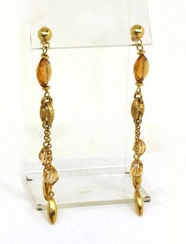 14k Yellow Gold Citrine Dangle Earrings Double Strand Design: 14k Yellow Gold Citrine Dangle Earrings Double Strand Design Elevate your style with these exquisite 14k yellow gold dangle earrings. Featuring vibrant faceted citrine gemstones, each earring showcase