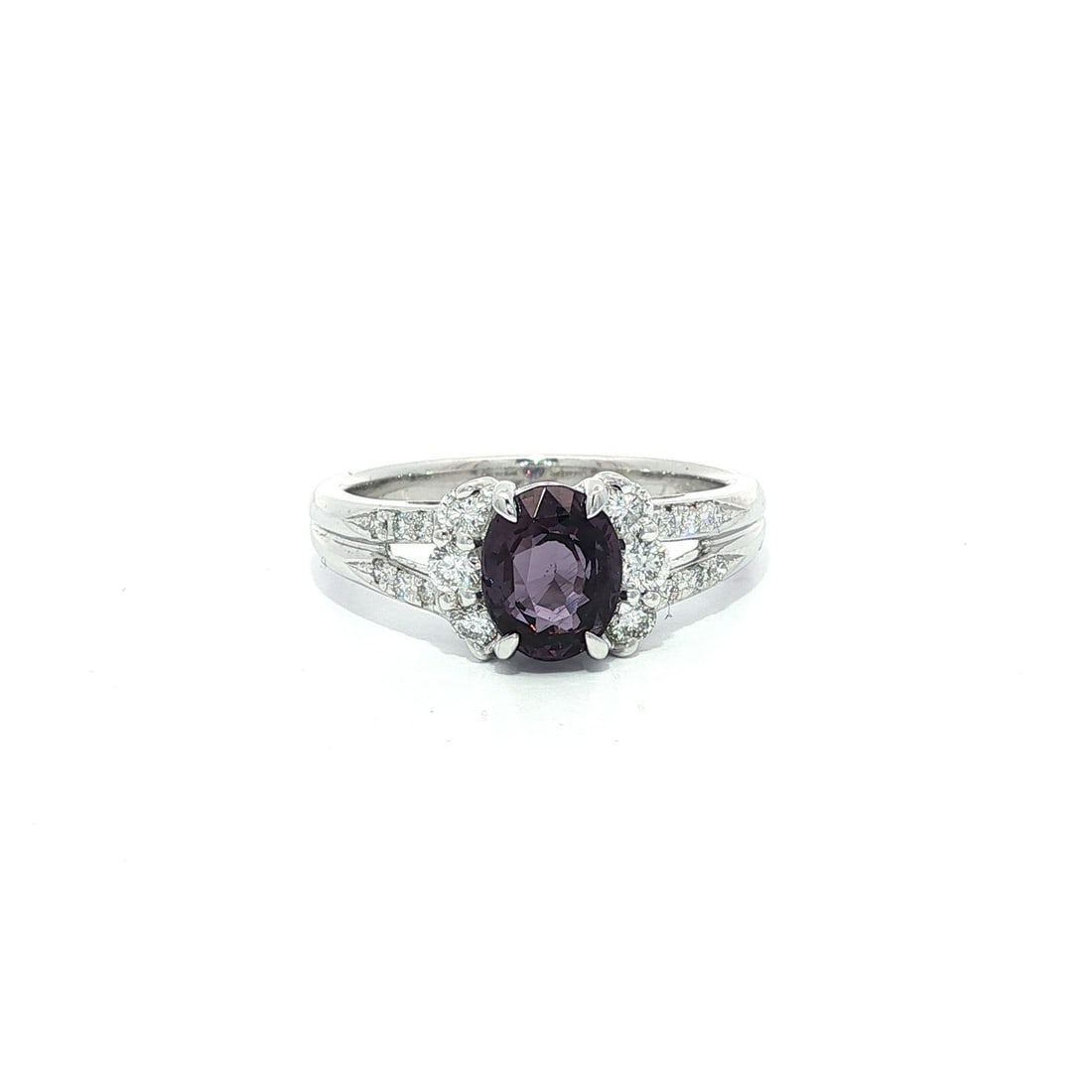 Platinum GIA Certified 1.67ctw Color Change Garnet Diamond Ring: Platinum GIA Certified 1.67ctw Color Change Garnet Diamond Ring This exquisite cocktail ring features a stunning natural garnet that showcases a captivating color change from violetish blue to pinkish