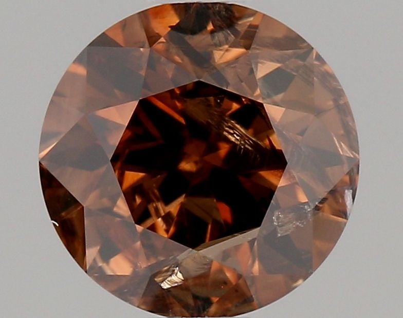 Loose Diamond - ROUND 0.64ct Fancy Dark Orange Brown I2: Loose Diamond - ROUND 0.64ct Fancy Dark Orange Brown I2 Source: Natural Shape: ROUND Carats: 0.64 Color: Fancy Dark Orange Brown Certification: GIA Video: