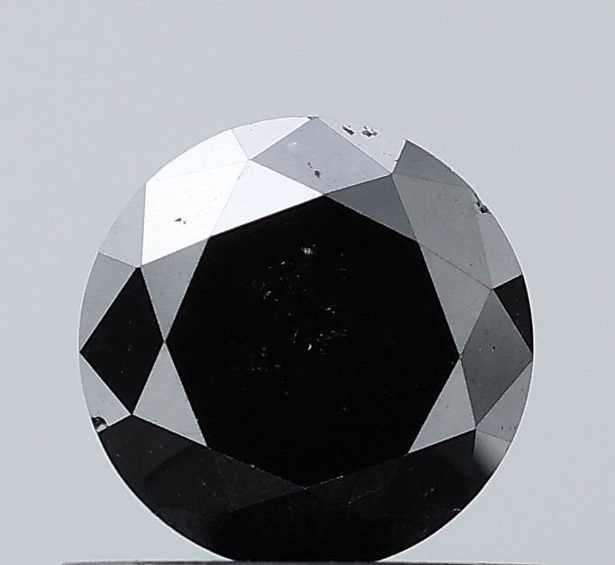 Loose Diamond - ROUND 0.76ct Fancy Black VS2: Loose Diamond - ROUND 0.76ct Fancy Black VS2 Source: Natural Shape: ROUND Carats: 0.76 Color: Fancy Black Certification: NONE Video:
