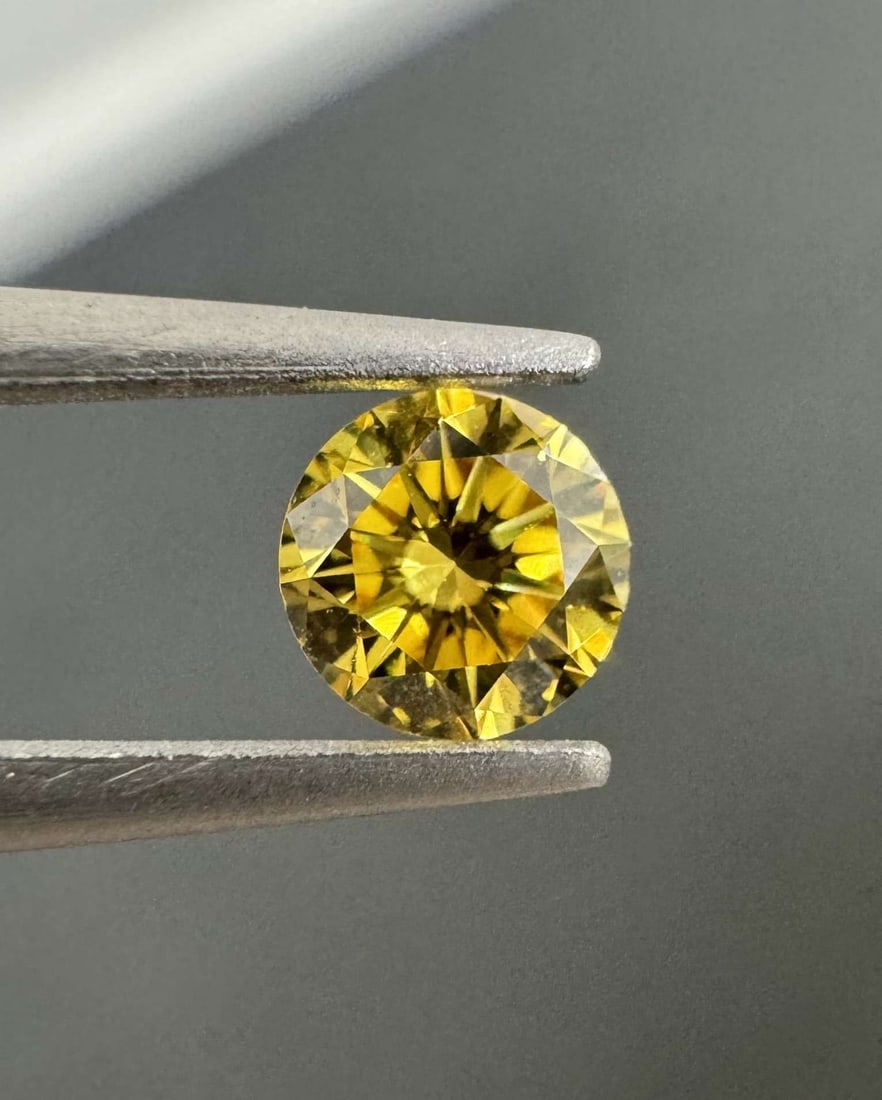 Loose Diamond - ROUND 0.21ct Fancy Deep Orangey Yellow VS2: Loose Diamond - ROUND 0.21ct Fancy Deep Orangey Yellow VS2 Source: Natural Shape: ROUND Carats: 0.21 Color: Fancy Deep Orangey Yellow Certification: GIA Video: