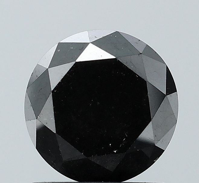 Loose Diamond - ROUND 1.38ct Black VVS2: Loose Diamond - ROUND 1.38ct Black VVS2 Source: Natural Shape: ROUND Carats: 1.38 Color: Black Certification: NONE Video: