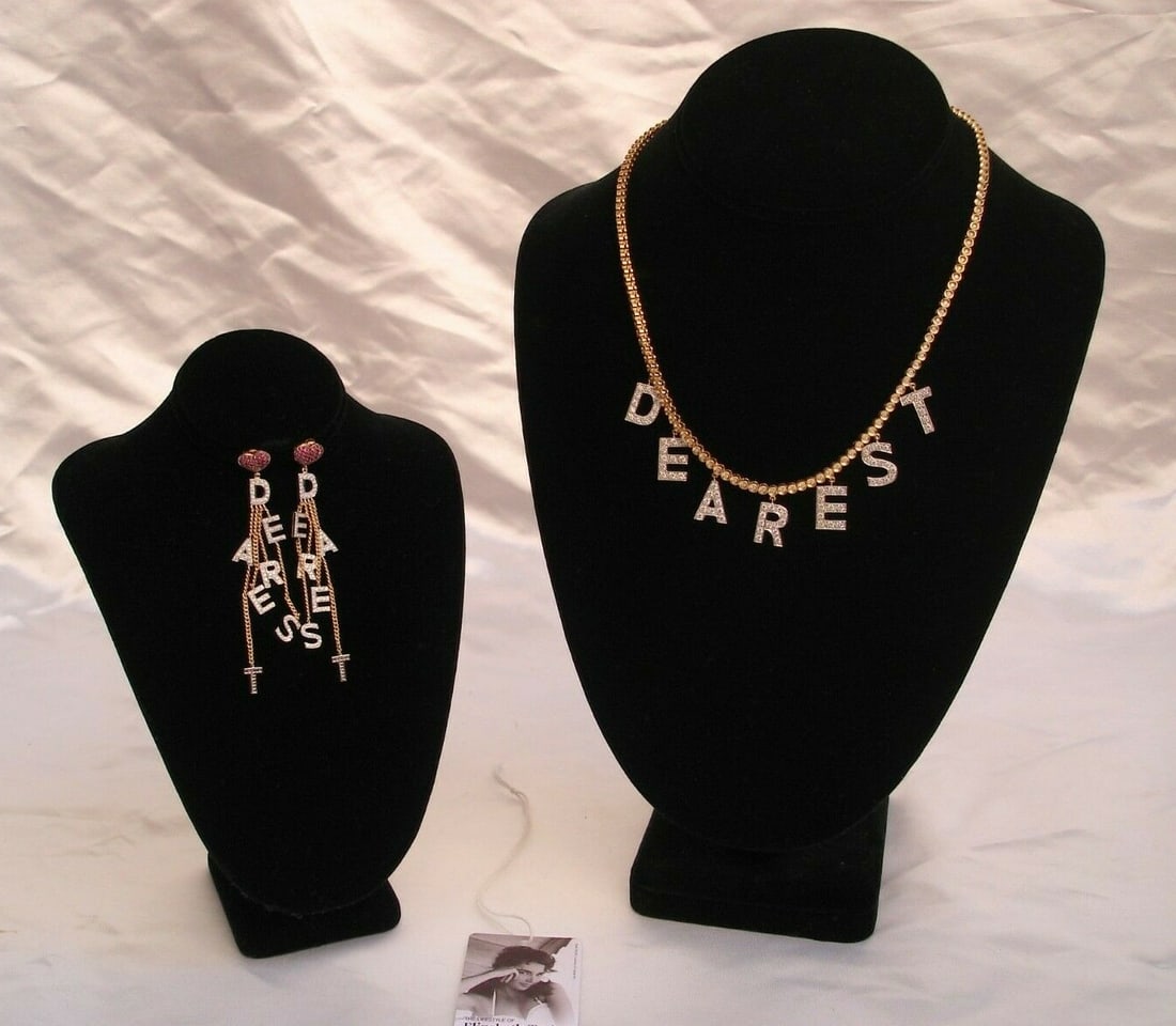 Elizabeth Taylor 18K Gold Diamond Sapphire Dearest Necklace Earrings Set: Elizabeth Taylor 18K Gold Diamond Sapphire Dearest Necklace Earrings Set Discover this exquisite jewelry set featuring an 18K gold necklace and earrings, originally designed by Richard Burton for Eliz