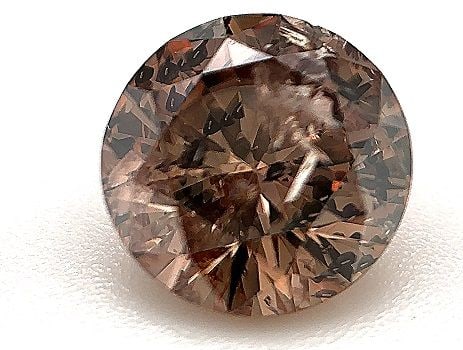 Loose Diamond - ROUND 1.02ct Fancy Dark Orangy Brown I2: Loose Diamond - ROUND 1.02ct Fancy Dark Orangy Brown I2 Source: Natural Shape: ROUND Carats: 1.02 Color: Fancy Dark Orangy Brown Certification: GIA The Diamond Depot Guarantee: All items in this aucti