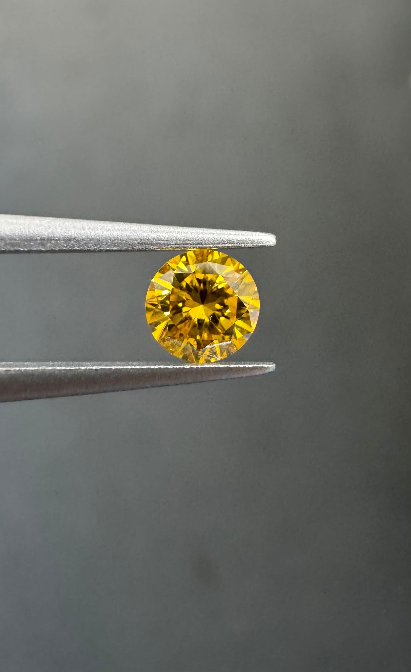 Loose Diamond - ROUND 0.27ct Fancy Vivid Orangey Yellow I1: Loose Diamond - ROUND 0.27ct Fancy Vivid Orangey Yellow I1 Source: Natural Shape: ROUND Carats: 0.27 Color: Fancy Vivid Orangey Yellow Certification: GIA The Diamond Depot Guarantee: All items in this