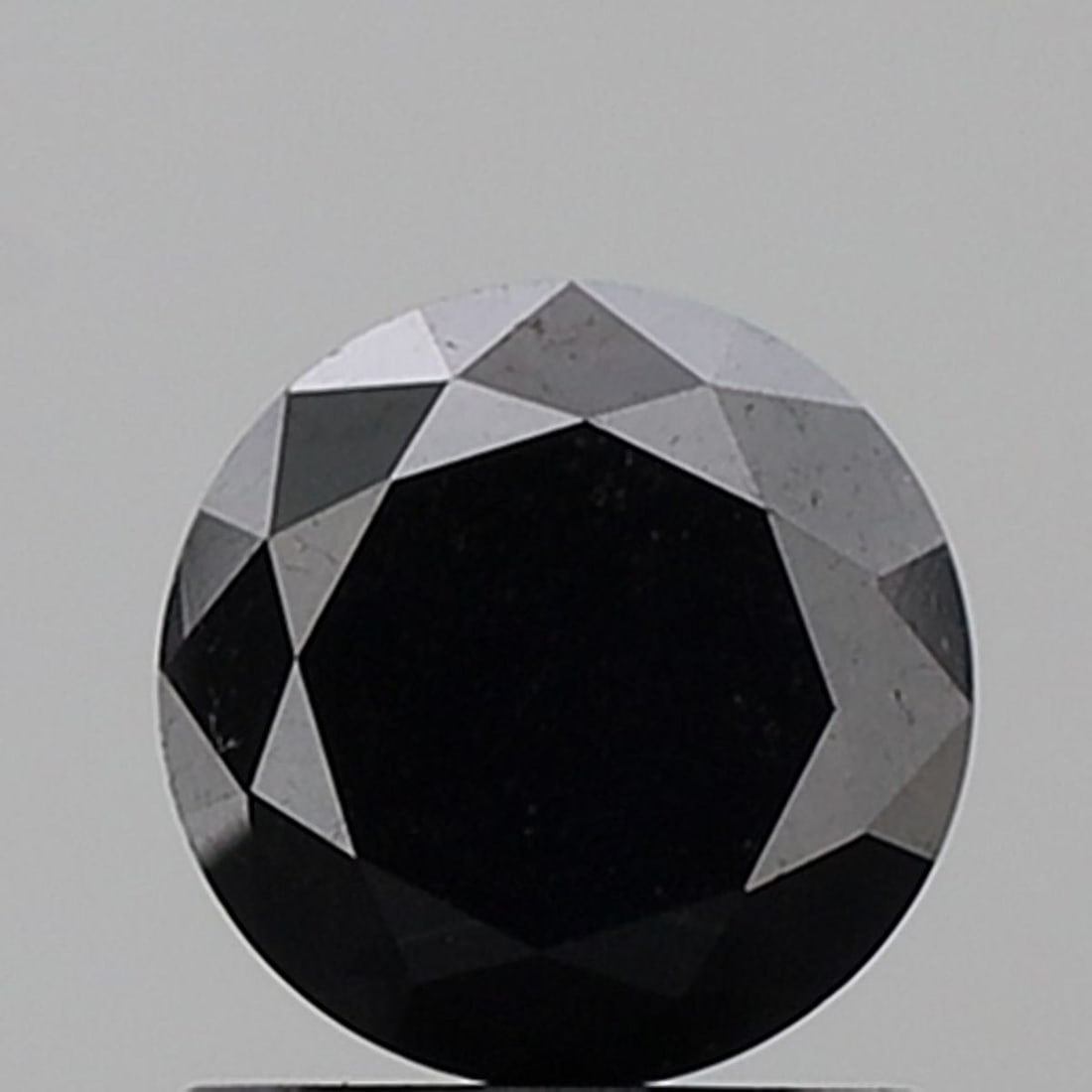 Loose Diamond - ROUND 1.24ct Fancy Black VS2: Loose Diamond - ROUND 1.24ct Fancy Black VS2 Source: Natural Shape: ROUND Carats: 1.24 Color: Fancy Black Certification: NONE Video: