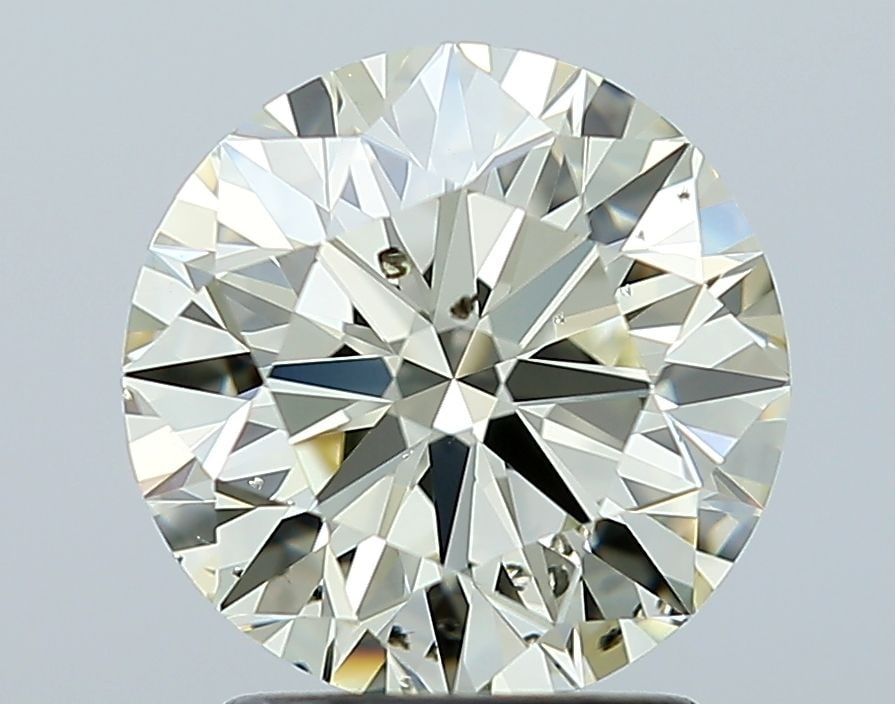 Loose Diamond - ROUND 2.01ct O-P SI2: Loose Diamond - ROUND 2.01ct O-P SI2 Source: Natural Shape: ROUND Carats: 2.01 Color: O-P Certification: NONE Video: