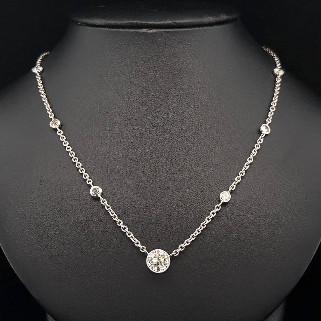 Antique Platinum 2.70ctw Old Cut Milgrain Bezel Diamond Necklace: Antique Platinum 2.70ctw Old Cut Milgrain Bezel Diamond Necklace This exquisite antique necklace features a stunning combination of old cut diamonds elegantly set in a solid platinum chain. The neckla