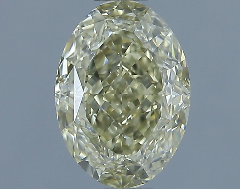 Loose Diamond - OVAL 1.02ct Fancy Light Yellow VS2: Loose Diamond - OVAL 1.02ct Fancy Light Yellow VS2 Source: Natural Shape: OVAL Carats: 1.02 Color: Fancy Light Yellow Certification: GIA The Diamond Depot Guarantee: All items in this auction are guar