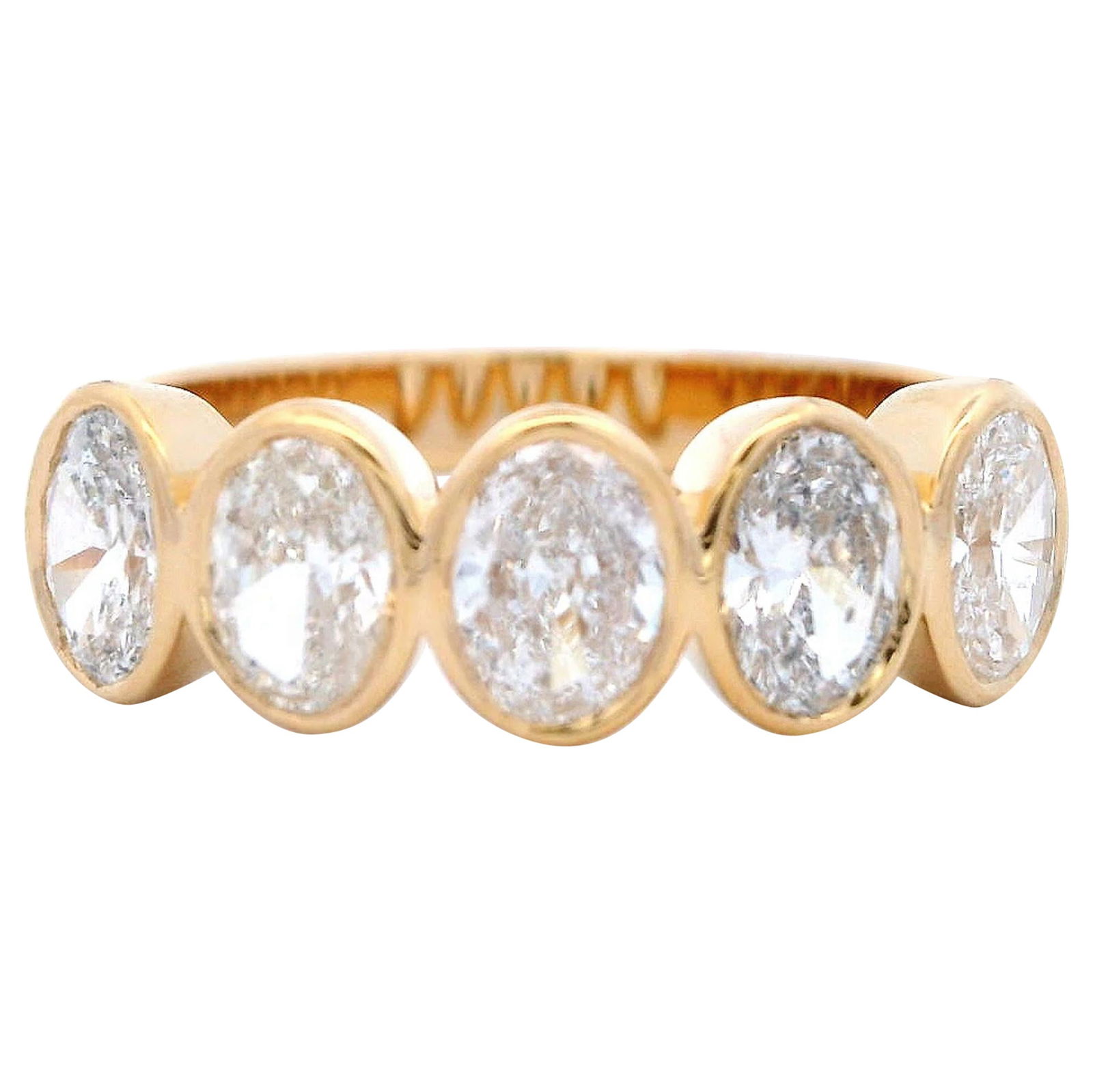 1.25ct Oval Diamond Half Eternity Band 18k Yellow Gold: 1.25ct Oval Diamond Half Eternity Band 18k Yellow Gold This exquisite half eternity band features five stunning oval cut diamonds, totaling 1.25 carats, beautifully set in 18k yellow gold. With a cont