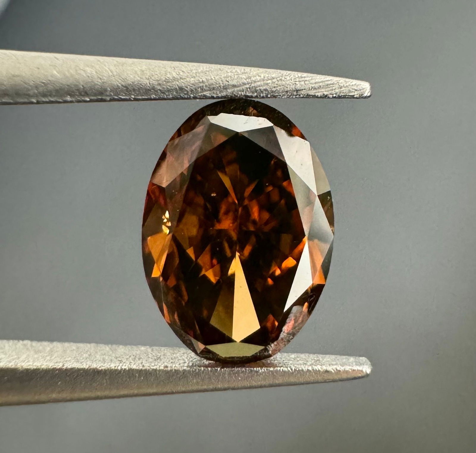 Loose Diamond - OVAL 0.56ct Fancy Dark Orange Brown VS2: Loose Diamond - OVAL 0.56ct Fancy Dark Orange Brown VS2 Source: Natural Shape: OVAL Carats: 0.56 Color: Fancy Dark Orange Brown Certification: GIA Video: