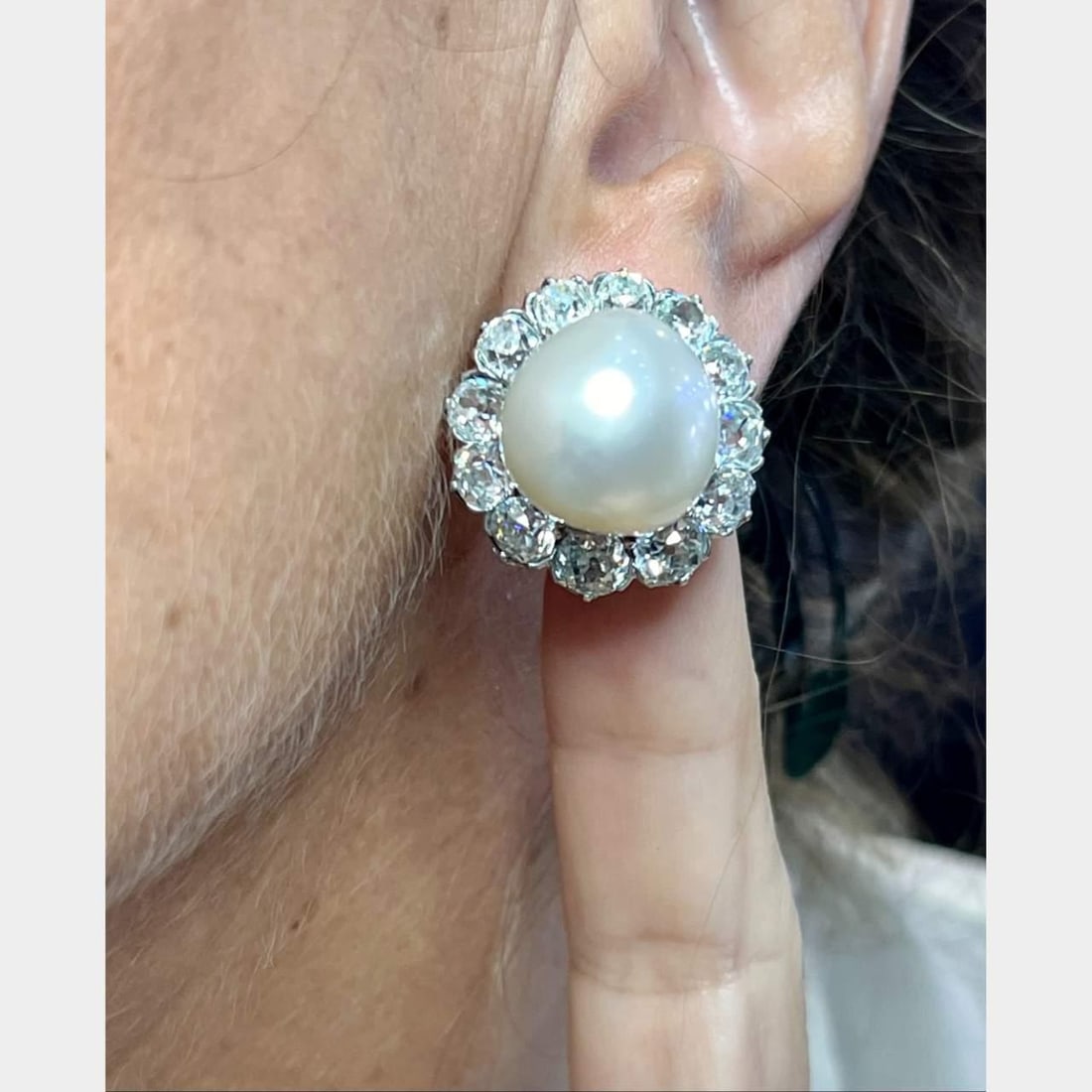 French 18K Gold Platinum South Sea Pearl Diamond Earrings: French 18K Gold Platinum South Sea Pearl Diamond Earrings Experience the elegance of these exquisite French earrings crafted from 18K yellow gold and platinum. Each earring features stunning South Sea