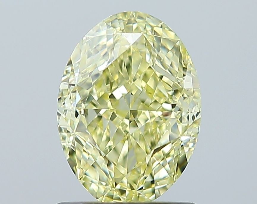 Loose Diamond - OVAL 1.5ct Fancy Yellow VVS2: Loose Diamond - OVAL 1.5ct Fancy Yellow VVS2 Source: Natural Shape: OVAL Carats: 1.5 Color: Fancy Yellow Certification: GIA Video: