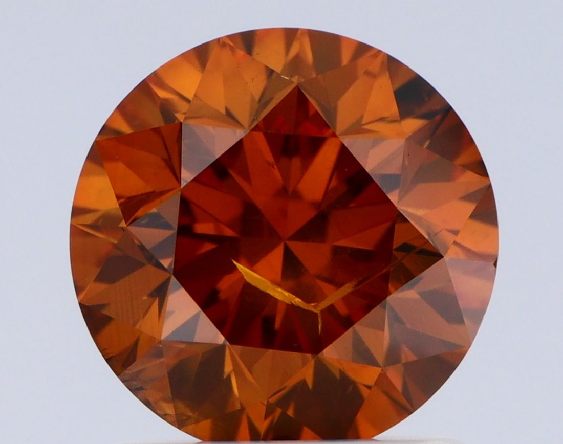 Loose Diamond - ROUND 1.27ct Fancy Deep Yellowish Brown I2: Loose Diamond - ROUND 1.27ct Fancy Deep Yellowish Brown I2 Source: Natural Shape: ROUND Carats: 1.27 Color: Fancy Deep Yellowish Brown Certification: GIA Video: