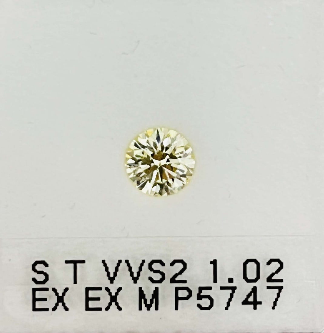 Loose Diamond - ROUND 1.02ct S-T VVS2: Loose Diamond - ROUND 1.02ct S-T VVS2 Source: Natural Shape: ROUND Carats: 1.02 Color: S-T Certification: GIA The Diamond Depot Guarantee: All items in this auction are guaranteed to be 100% authentic