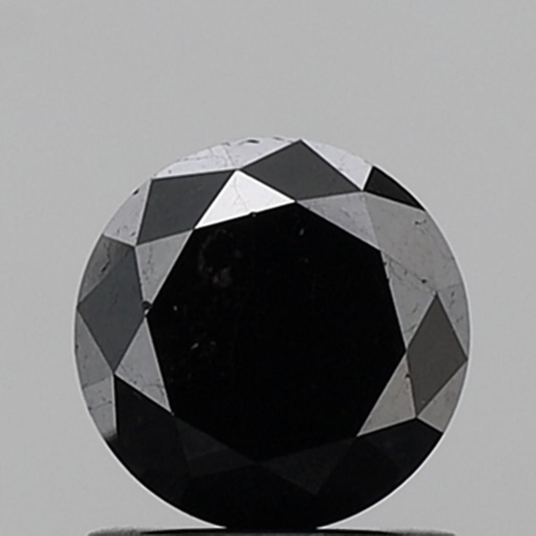 Loose Diamond - ROUND 1.22ct Fancy Black VS1: Loose Diamond - ROUND 1.22ct Fancy Black VS1 Source: Natural Shape: ROUND Carats: 1.22 Color: Fancy Black Certification: NONE Video: