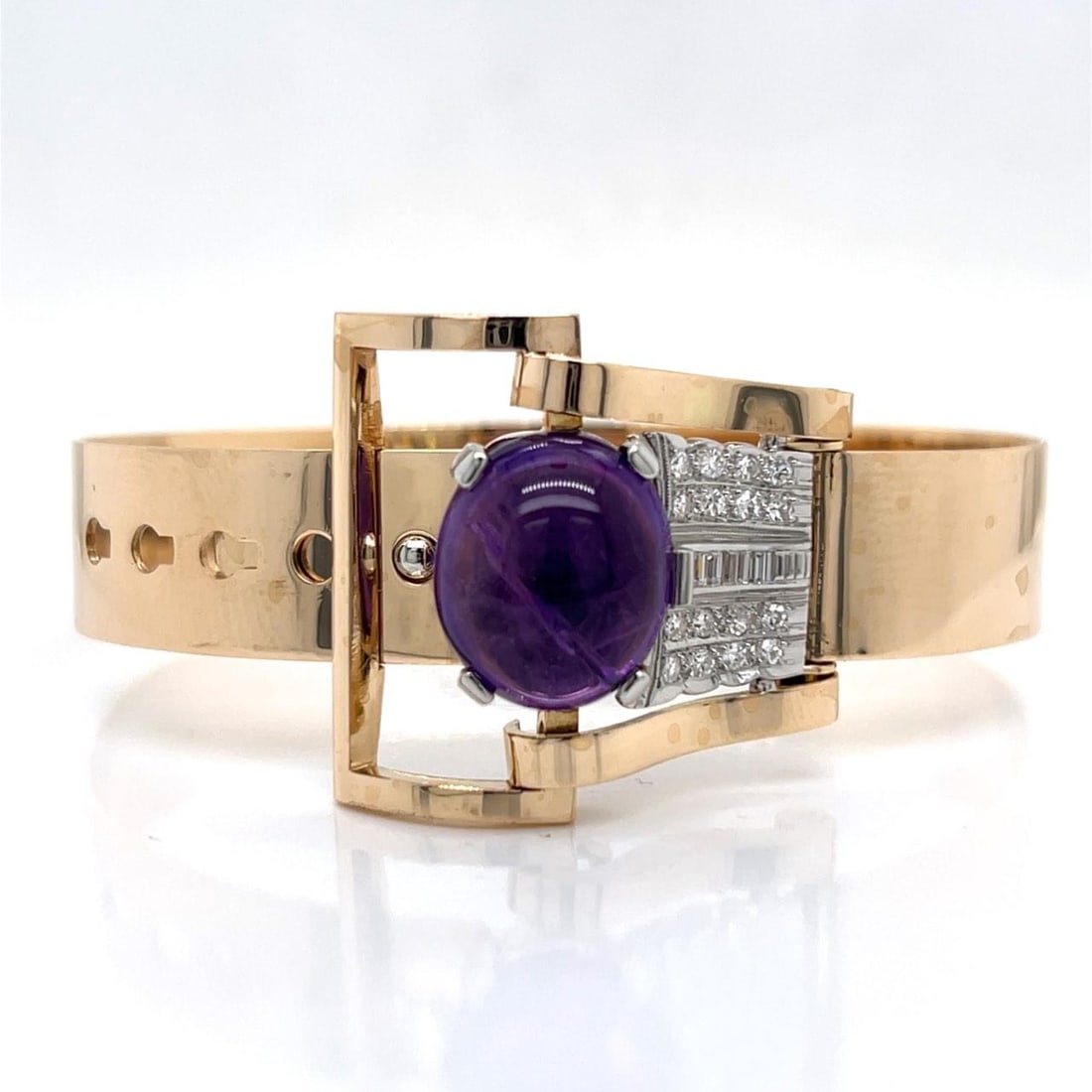 14K Yellow Gold Platinum Bracelet with Amethyst and 22 Diamonds by Birks: 14K Yellow Gold Platinum Bracelet with Amethyst and 22 Diamonds by Birks This bracelet features 14K yellow gold and platinum, set with approximately 0.70 carat total weight of 22 diamonds in F-G color
