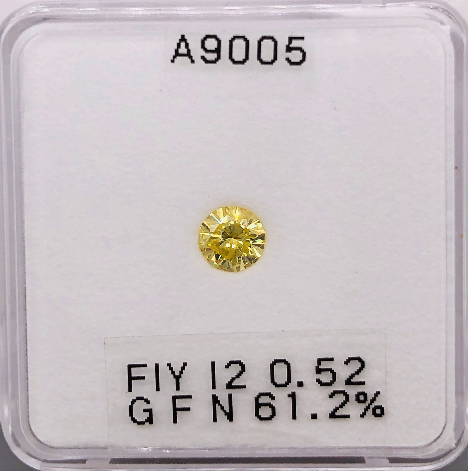 Loose Diamond - ROUND 0.52ct Fancy Intense Yellow I2: Loose Diamond - ROUND 0.52ct Fancy Intense Yellow I2 Source: Natural Shape: ROUND Carats: 0.52 Color: Fancy Intense Yellow Certification: GIA The Diamond Depot Guarantee: All items in this auction are