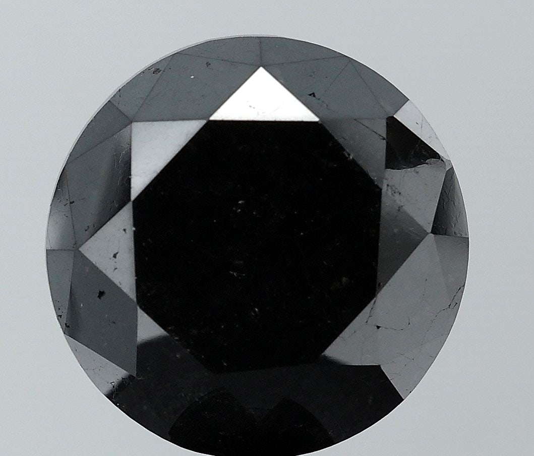 Loose Diamond - ROUND 11.05ct Fancy Black VS2: Loose Diamond - ROUND 11.05ct Fancy Black VS2 Source: Natural Shape: ROUND Carats: 11.05 Color: Fancy Black Certification: NONE Video: