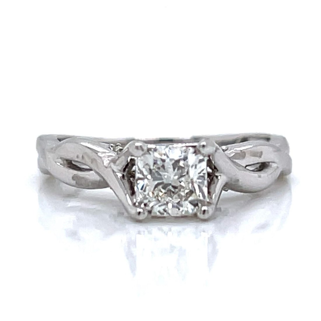 14K White Gold Ring with 0.76 Ct Cushion-cut Diamond: 14K White Gold Ring with 0.76 Ct Cushion-cut Diamond This stunning 14K white gold diamond ring features a beautiful 0.76 Ct. cushion-cut diamond with H color and VVS clarity. The ring is further adorn