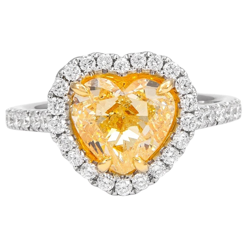 2.58ct Fancy Light Yellow Diamond Ring GIA Certified: 2.58ct Fancy Light Yellow Diamond Ring GIA Certified This stunning ring features a 2.58 carat Fancy Light Yellow diamond at its center, certified by GIA, showcasing I1 clarity and a beautiful heart cu