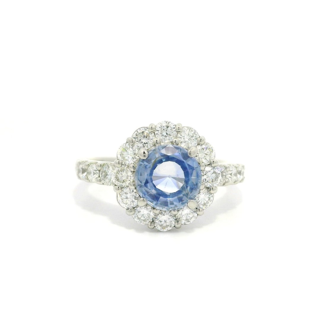 Platinum GIA Certified 2.66ctw No Heat Sapphire Diamond Halo Ring: Platinum GIA Certified 2.66ctw No Heat Sapphire Diamond Halo Ring This stunning cocktail ring features a captivating natural blue sapphire, weighing 1.73 carats, with a round brilliant cut and no heat